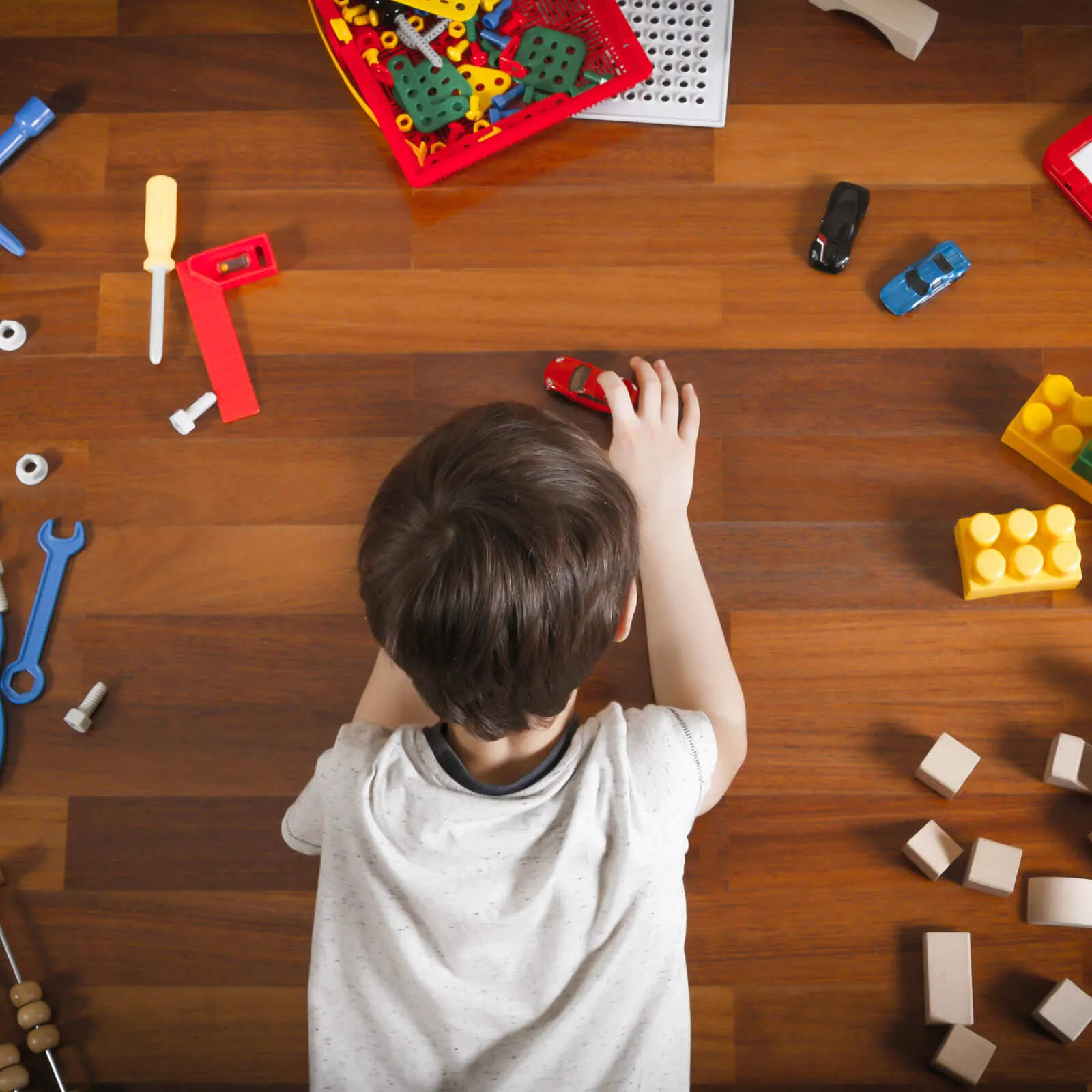 Kid playing with toys | The Carpet Stop