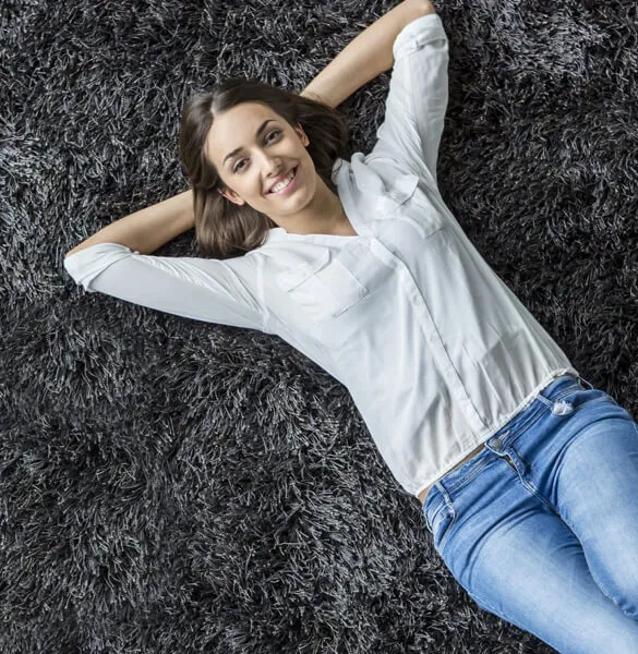 Lady chilling on carpet | The Carpet Stop
