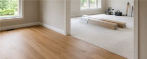 Warm wood flooring in a bright open room | The Carpet Stop